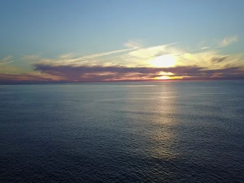 Sunset over ocean 4K Stock Footage 71166678