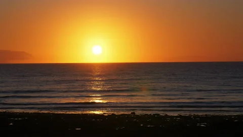 Sunset over the ocean in 4K Video stock 94404549