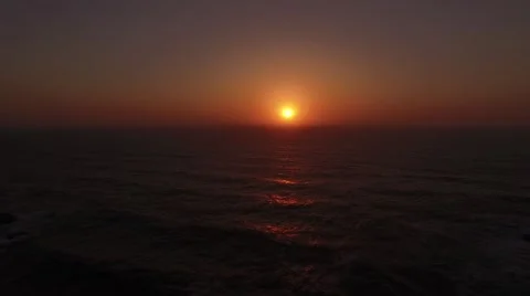 Sunset over the ocean aerial view Stock Footage 65457437