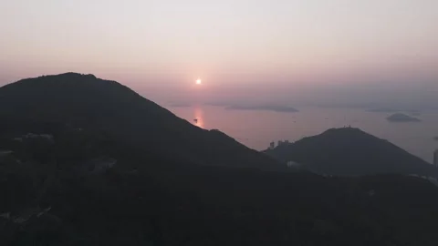 Sunset Over Ocean and Mountains Hong Kong Aerial Scenic Panorama Stockbeeldmateriaal 331761280