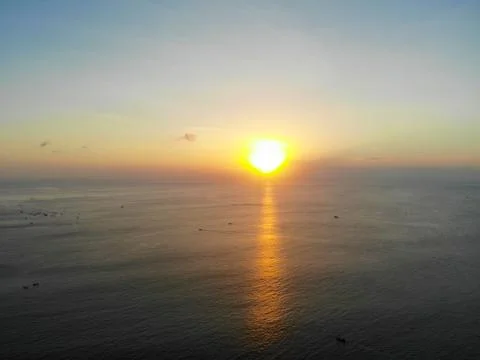 Sunset over the ocean in Bali Stock Photos
