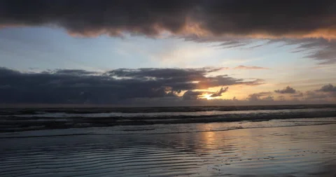 Sunset Over Ocean Beach Stock Footage 165301904