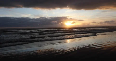 Sunset Over Ocean Beach Stock Footage 165302039