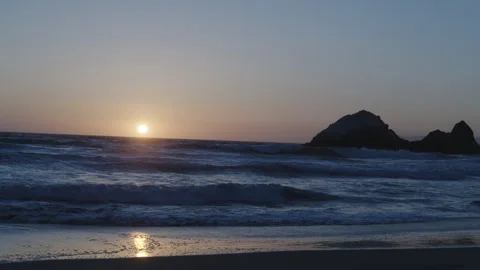 Sunset Over Ocean with Bird Rock Vídeo Stock 310337324