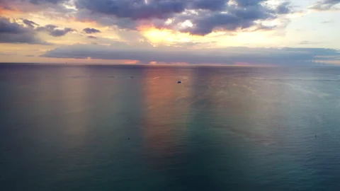 Sunset over the ocean. Drone approaching boat Stock Footage 253115329