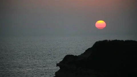 Sunset over the ocean Stock Footage 8692088