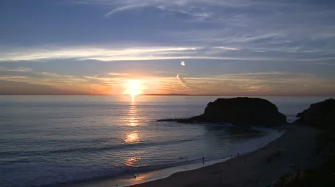 Sunset over the ocean with islands and beach Stock Footage