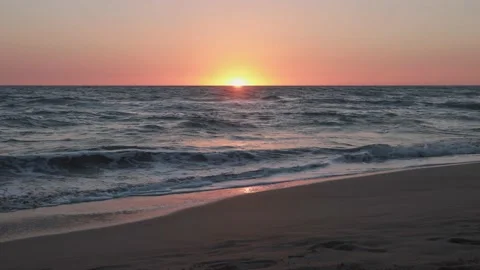 Sunset over ocean Patara beach Turkey 4k Breaking waves Stock Footage 222014764