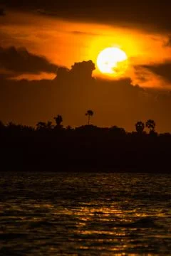 Sunset over ocean Stock Photos