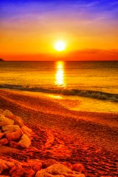 Sunset over the ocean Stock Photos