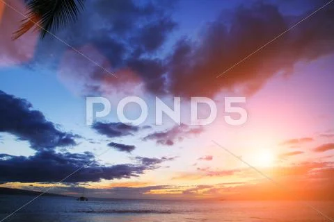 Sunset over ocean Stock Photos