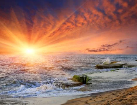 Sunset over ocean Stock Photos