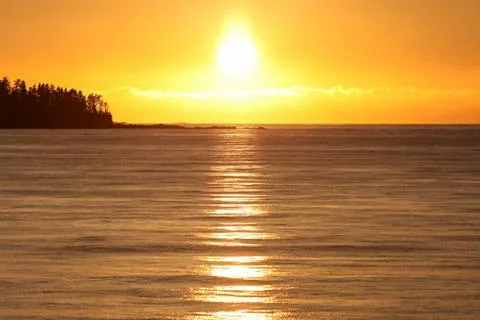 Sunset over ocean Stock Photos