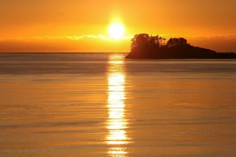 Sunset over ocean Stock Photos