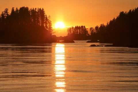 Sunset over ocean Stock Photos
