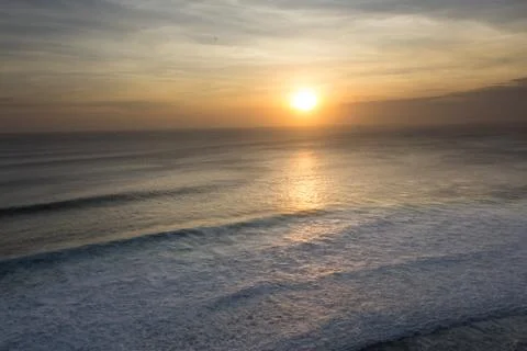Sunset over ocean Stock Photos