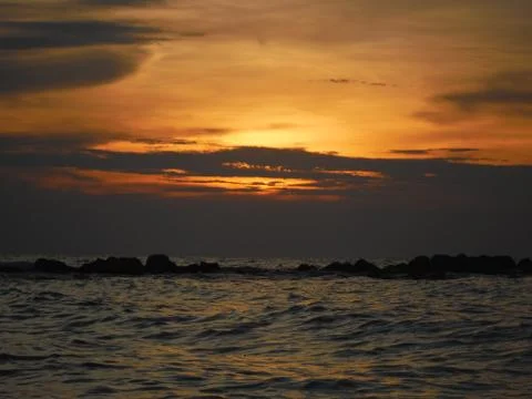 Sunset over the ocean Stock Photos