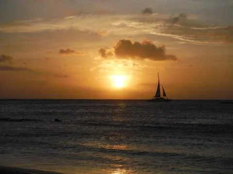 Sunset over the ocean Stock Photos