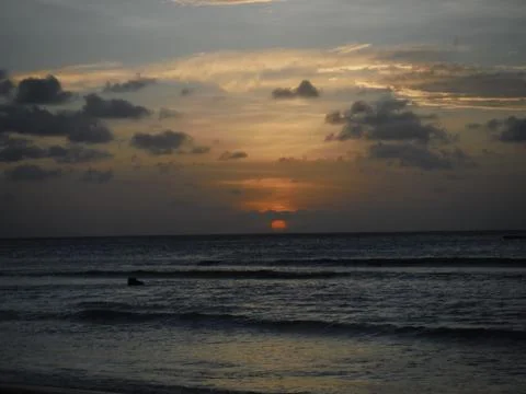 Sunset over the ocean Stock Photos