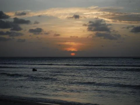 Sunset over the ocean Stock Photos