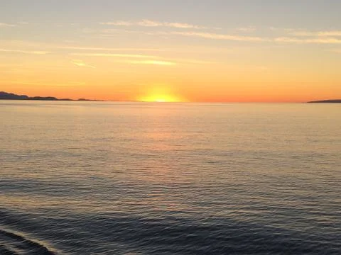 Sunset over ocean Foto stock