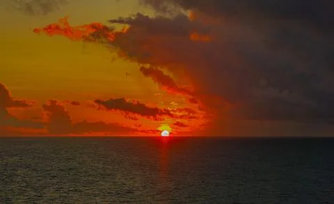 Sunset over the ocean Photos