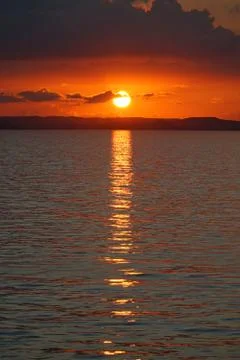 Sunset over the ocean Stock Photos