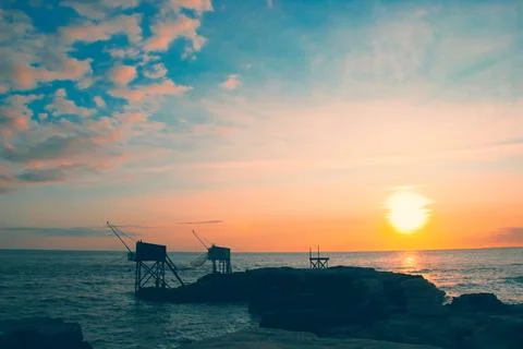 Sunset over the ocean Stock Photos