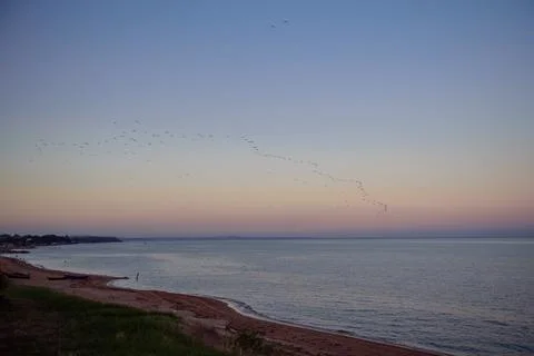 Sunset over an ocean Stock Photos