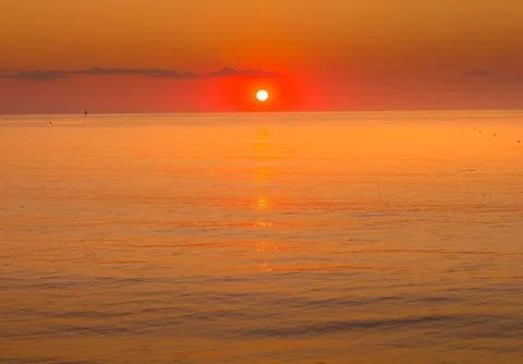 A sunset over the ocean 스톡 사진
