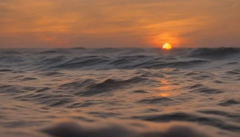 Sunset over the ocean Stock Photos