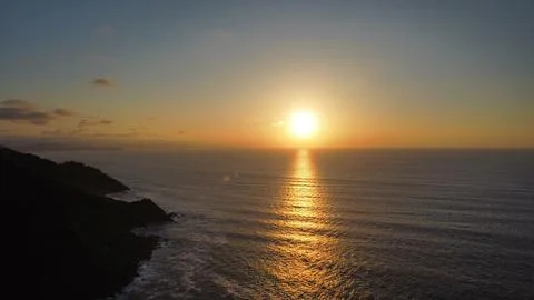 Sunset over the ocean Stock Photos