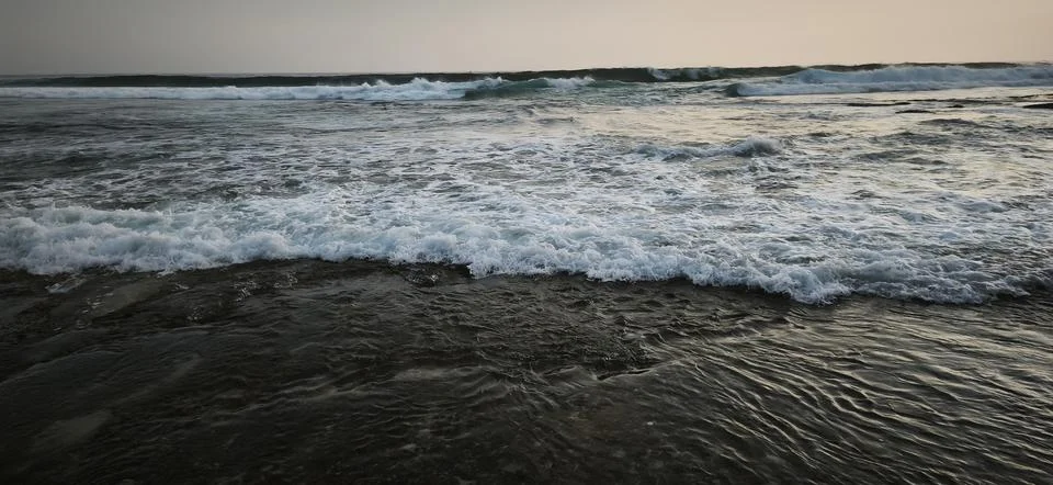 Sunset over the ocean Stock Photos