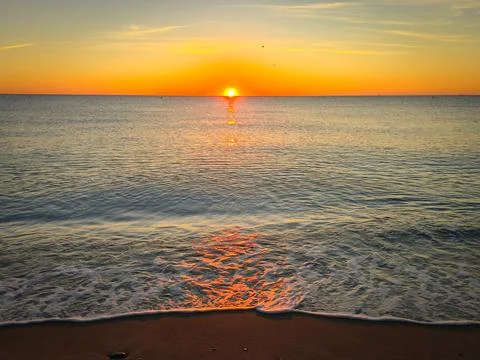 A sunset over the ocean 스톡 사진