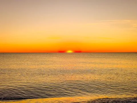A sunset over the ocean Stock-Fotos