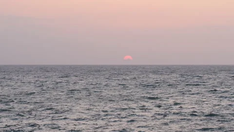 Sunset over the Ocean (real time/panning) Stock Footage 142058062