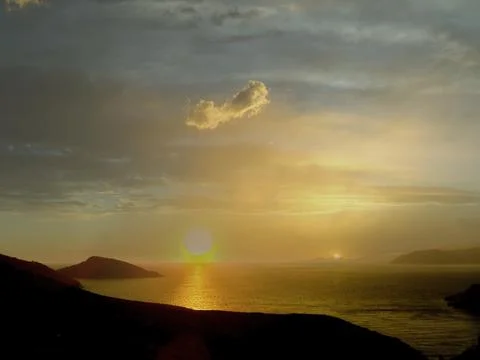 Sunset over the ocean at the summertime Stock Photos