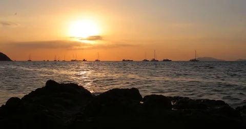 Sunset over Ocean - Timelapse of Beautiful Orange Sun Setting on Sea - Time Stock Footage 78711428