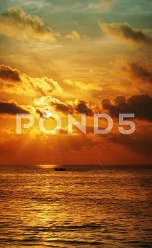Sunset over the ocean. vertical high resolution panorama. Stock Photos