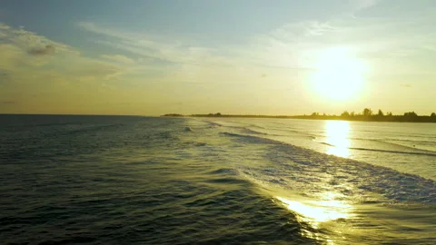 Sunset over Ocean Waves Laamu Atoll Maldives Stock Footage 135212554
