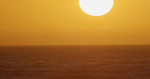 Sunset over ocean waves shot on red Stock Footage 127120912