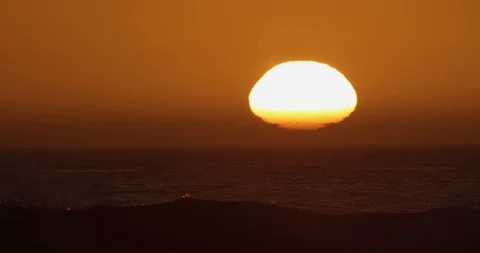 Sunset over ocean waves shot on red Stock Footage 127121345