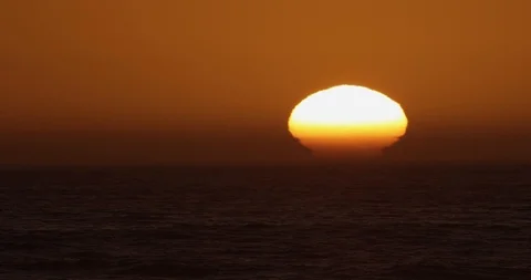 Sunset over ocean waves shot on red Stock Footage 127121398