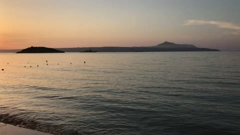 Sunset over the ocean (Young boy in the background) Stock Footage 155628548