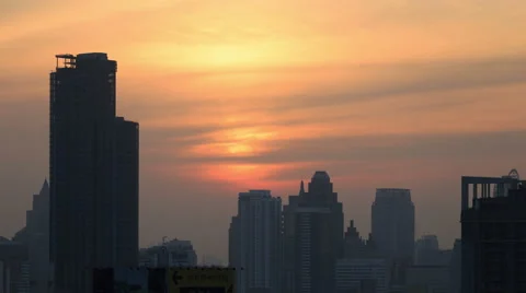 Sunset over office building in Bangkok timelase 4K UHD Stock Footage 56572556