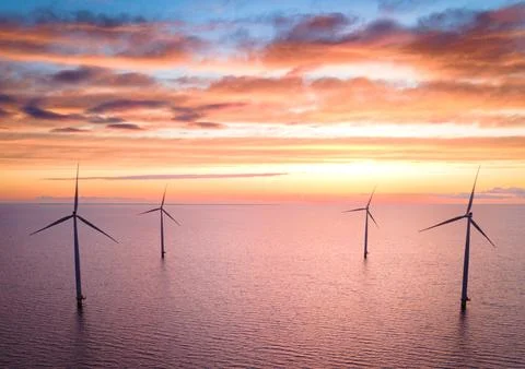 Sunset Over Offshore Wind Farm in the Netherlands Stock Photos