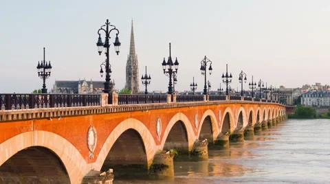 Sunset over the old bridge in Bordeaux city Stock Footage 60047121