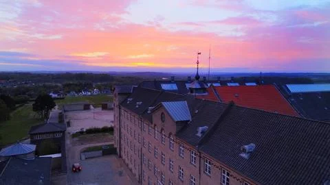 A sunset over an old prison Stock Photos