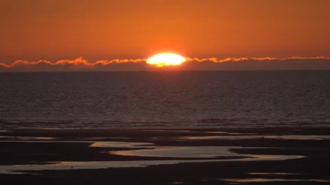 Sunset over Opal Coast tidal flats in France Video stock 332109060