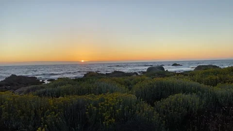 Sunset over Pacific at Pebble Beach Stock Footage 169112234